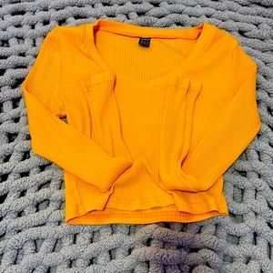 Orange long sleeve crop top